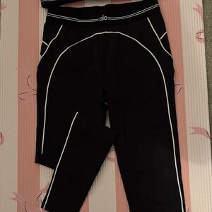 ALO Yoga women highLeggings with White Accents (heart throb ) . And sports bra .